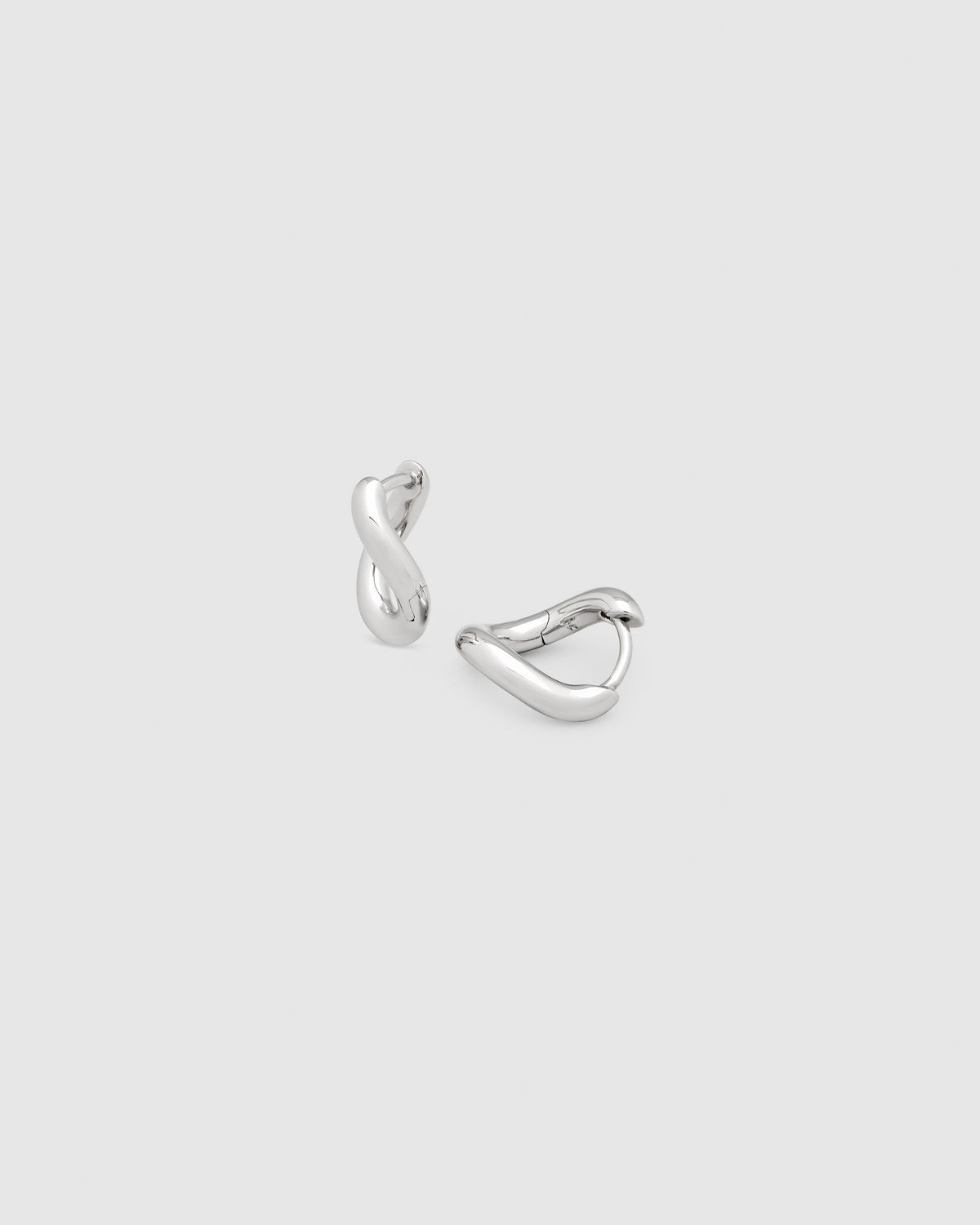 Trace Sculptural Huggie Earrings in Silver, primary view