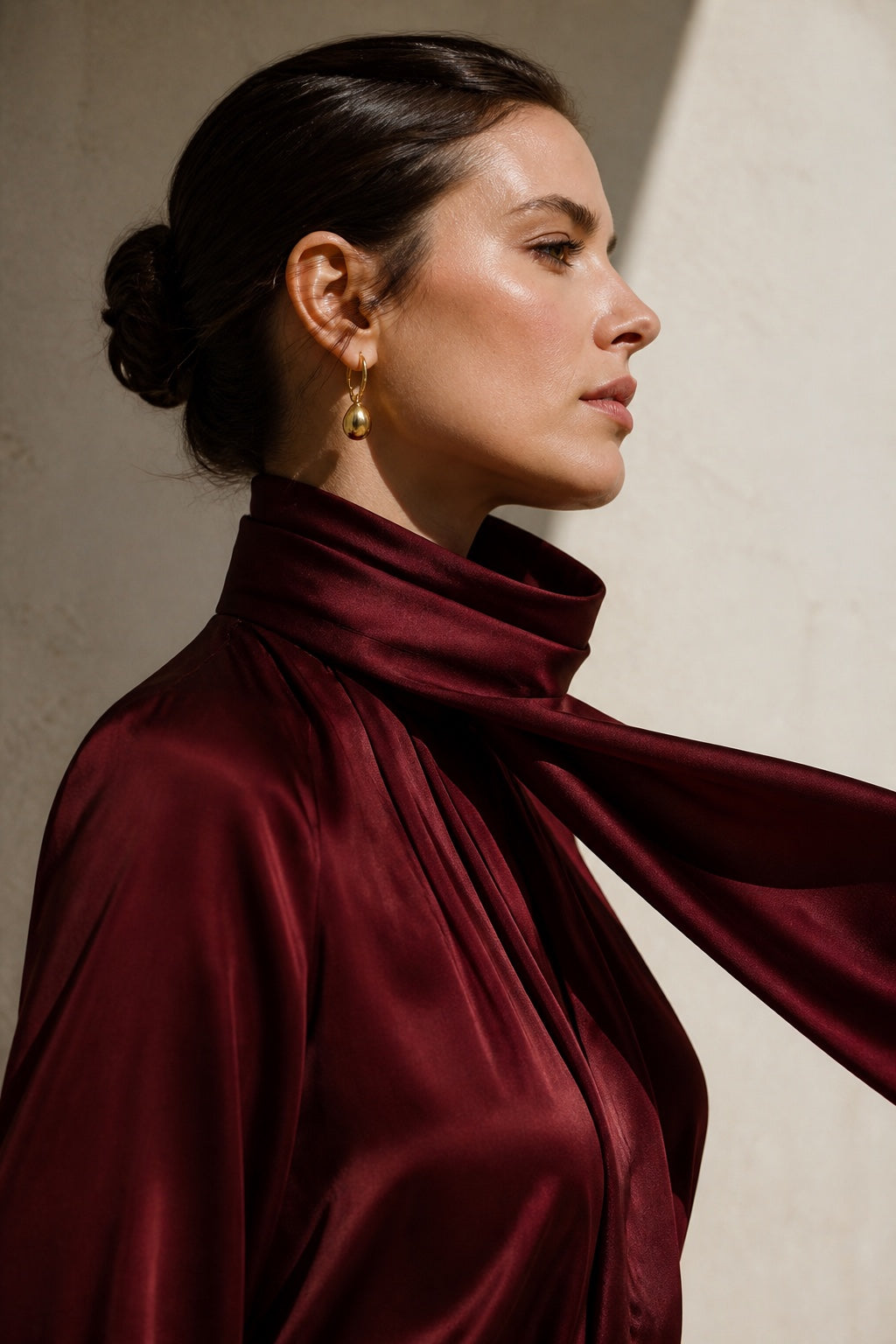 Woman wearing oxblood silk